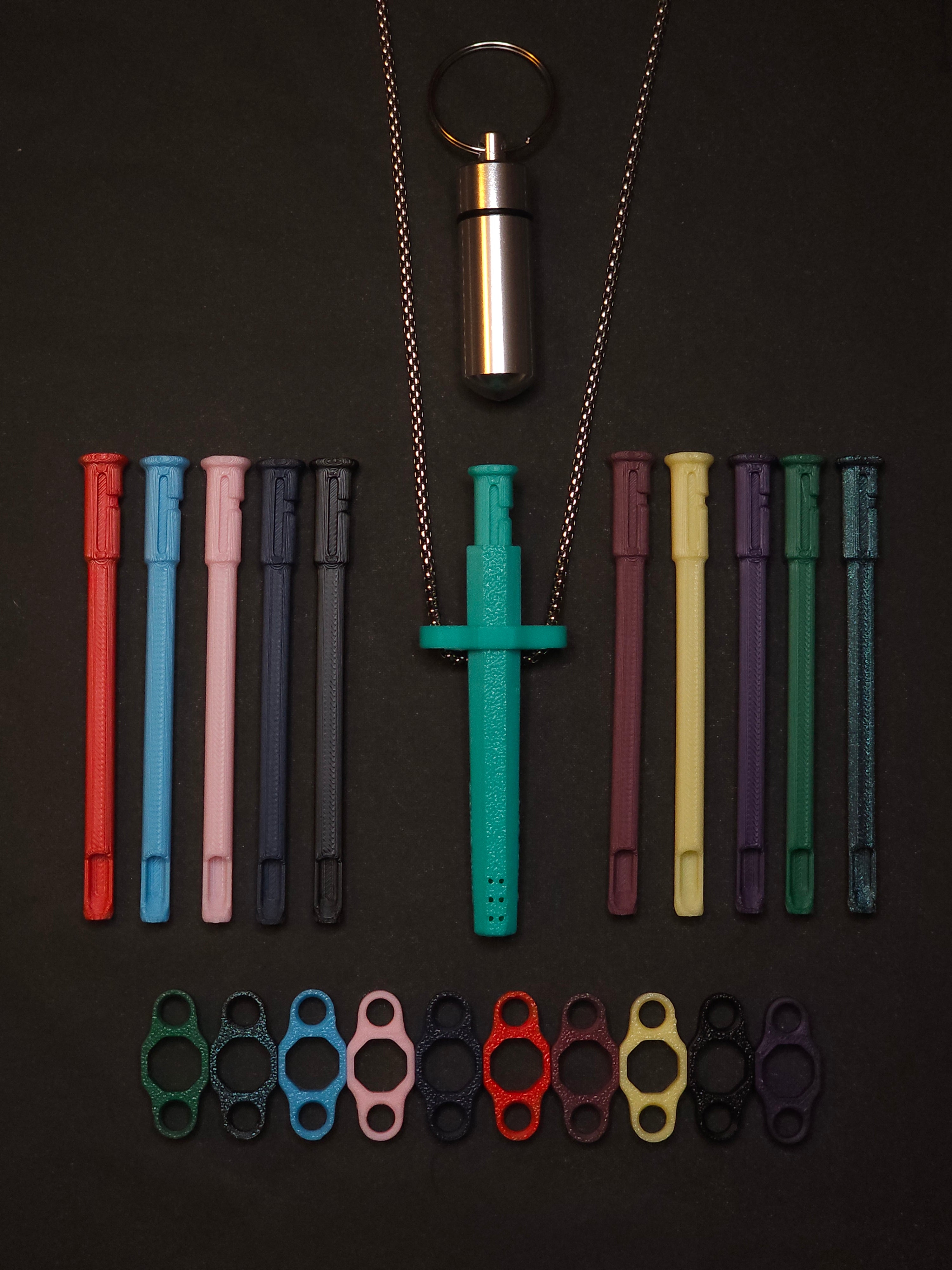 All 11 Colors bundle contents: Sniff & Slide Color Remix pendant with every color insert laid out in a row