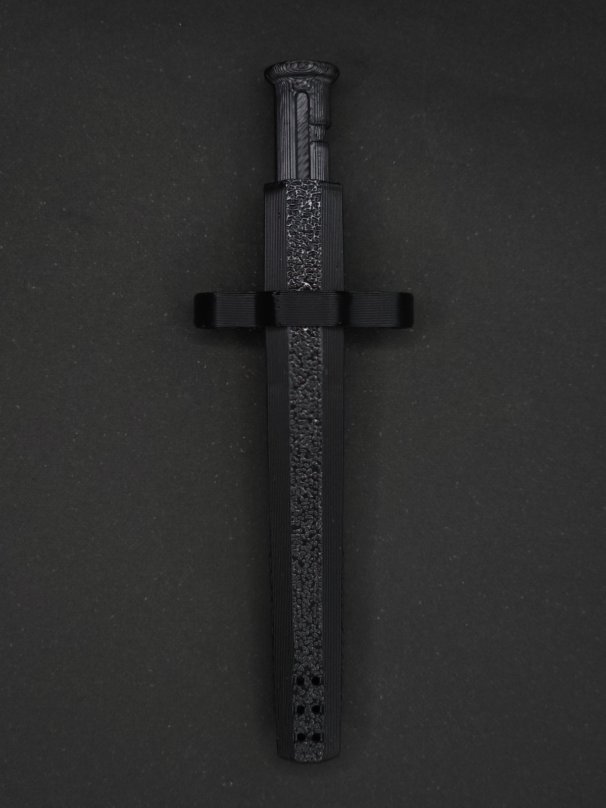 Black necklace adapter on a Black Sniff & Slide spring-loaded bump straw necklace, dark gray background.