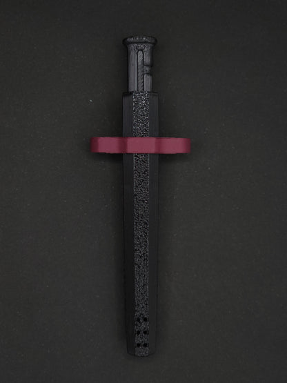 Burgundy necklace adapter on a Black Sniff & Slide spring-loaded bump straw necklace, dark gray background.