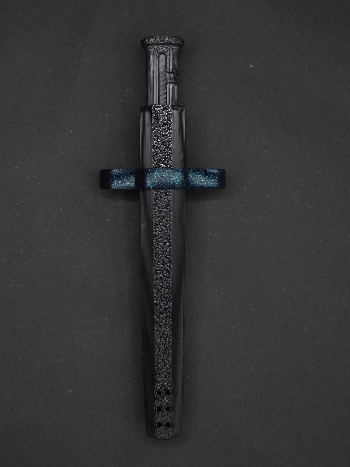 Galaxy Blue necklace adapter on a Black Sniff & Slide spring-loaded bump straw necklace, dark gray background.