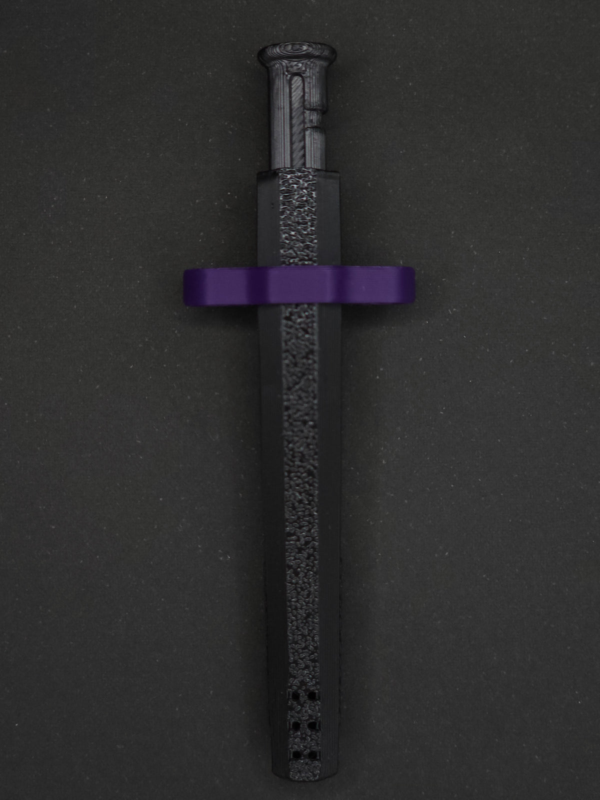 Purple necklace adapter on a Black Sniff & Slide spring-loaded bump straw necklace, dark gray background.