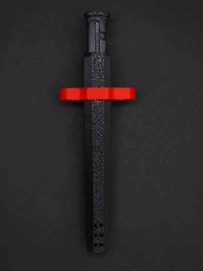 Red necklace adapter on a Black Sniff & Slide spring-loaded bump straw necklace, dark gray background.