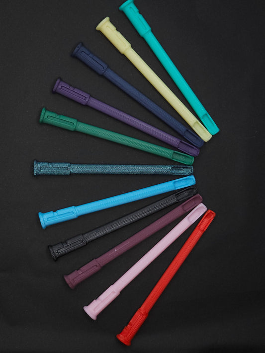 A set of 11 colorful plastic scoop straws arranged in a fan shape on a black background, showing a variety of colors including red, pink, burgundy, black, blue, green, purple, navy, yellow, and teal.