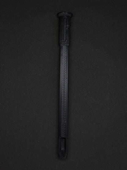 A black textured plastic straw scoop insert accessory, shown vertically on a dark gray background.