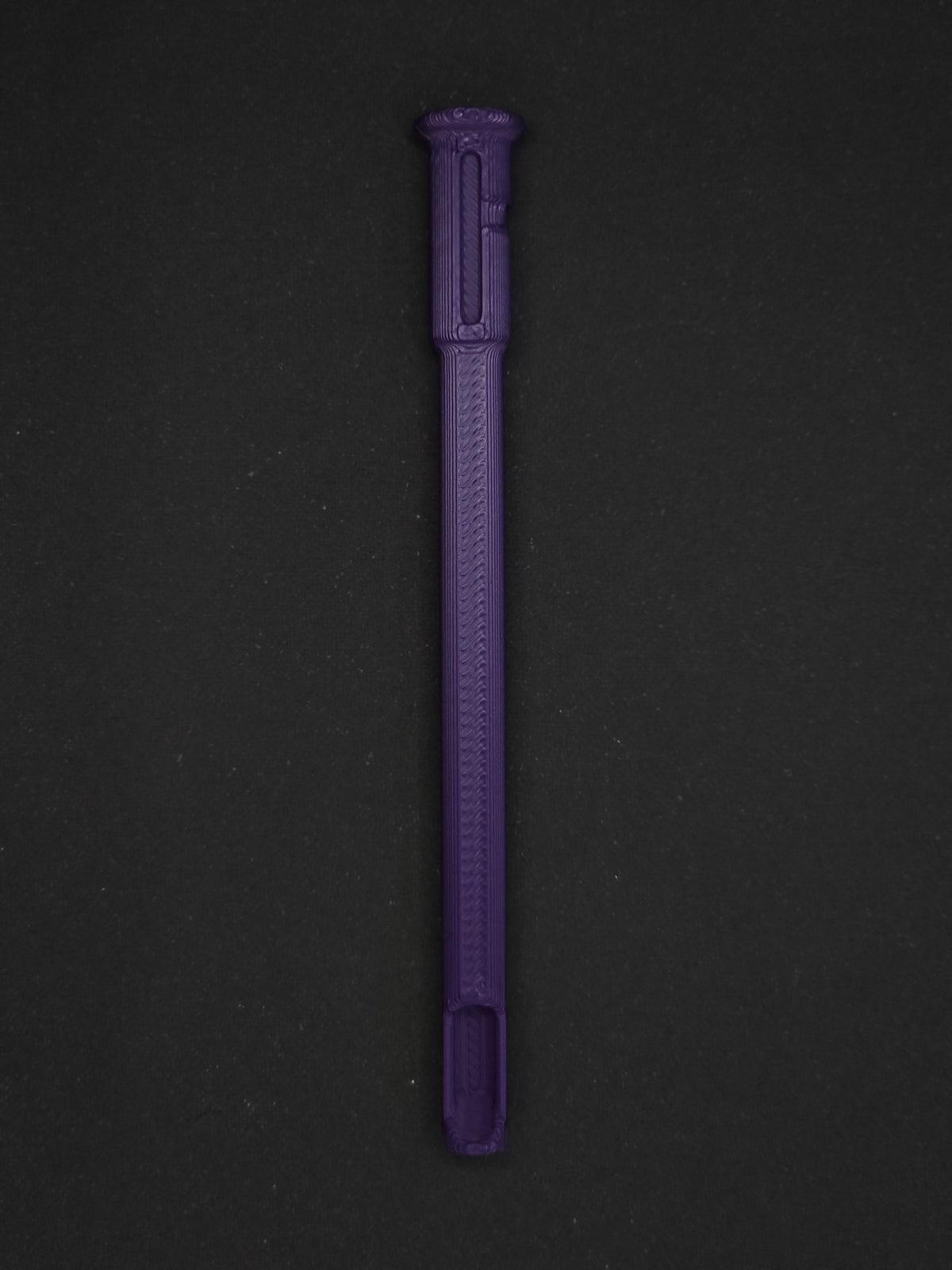 A purple textured plastic straw scoop insert accessory, shown vertically on a dark gray background.