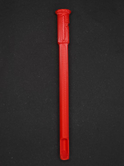 A red textured plastic straw scoop insert accessory, shown vertically on a dark gray background.
